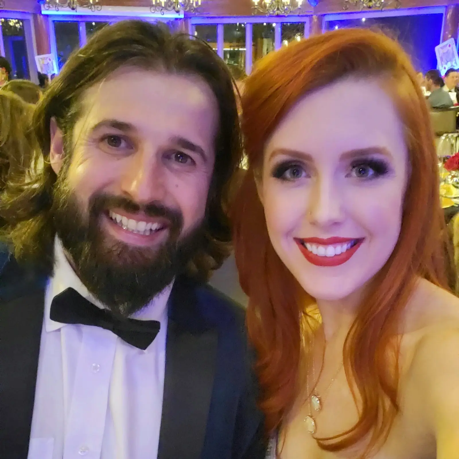 Mitch in a tuxedo and bow tie with Brittany at an evening event